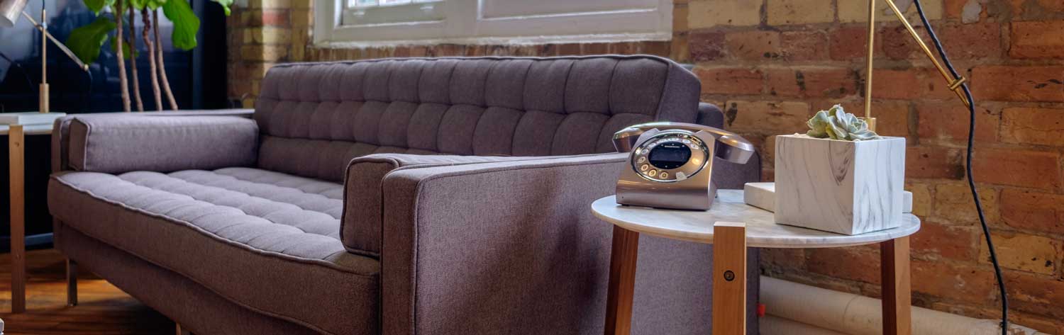 phone on table next to couch